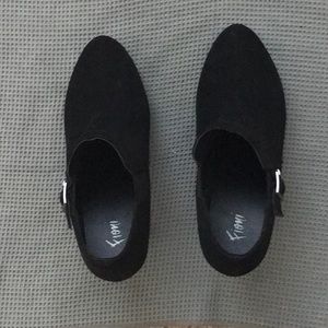 Black micro suede heeled bootie.